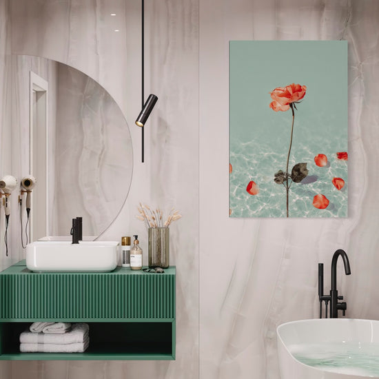 Dipped Rose II coral rose with petals art shown framed on a wall in a marble bathroom with a green vanity