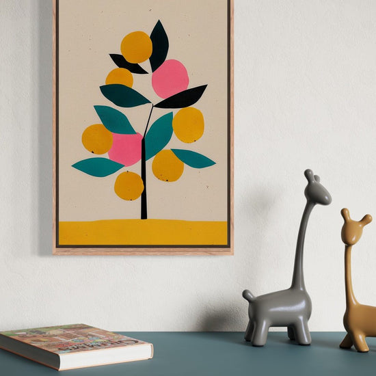 Fruit Tree illustration in an oak frame shown on a wall above a teal sideboard with giraffe figurines