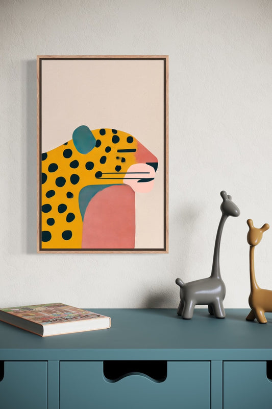 Jaguar illustration in an oak frame shown on a wall above a teal sideboard with giraffe figurines