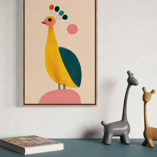 Peacock illustration in an oak frame shown on a wall above a teal sideboard with giraffe figurines