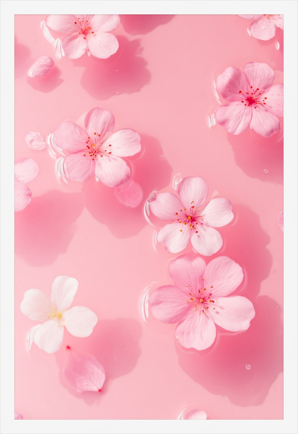 Petal Gelée II framed art print: pastel blossoms drifting on blush water