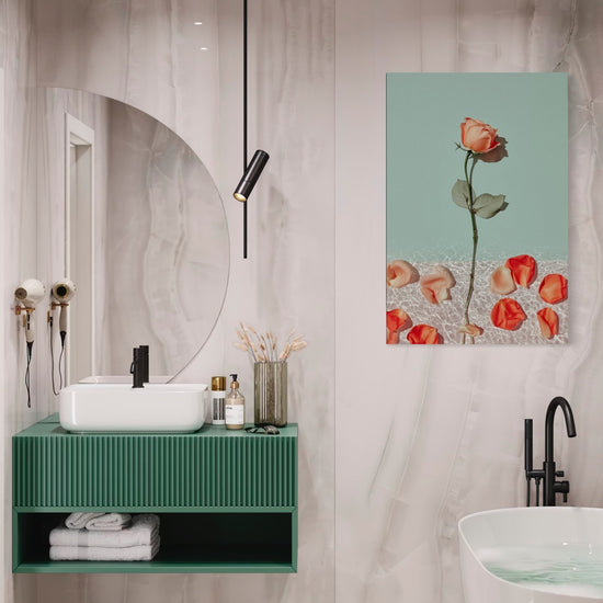 Dipped Rose I coral rose art shown framed on a wall in a marble bathroom with a green vanity