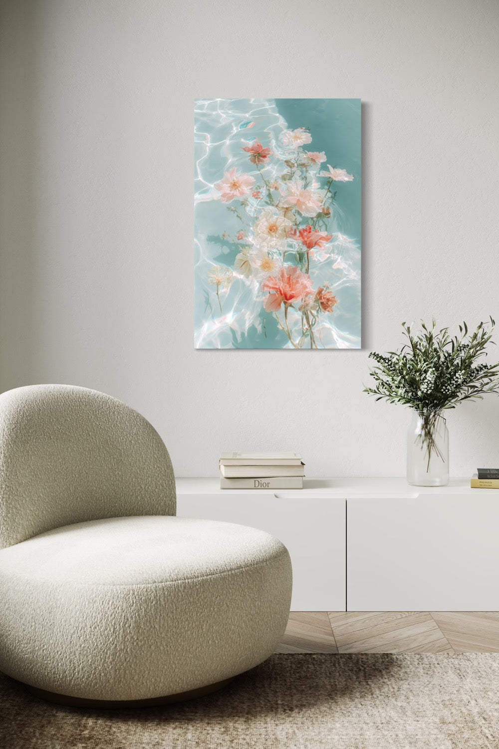 Water Bouquet I shown as a canvas on a wall above a white console with a bouclé chair and olive branches
