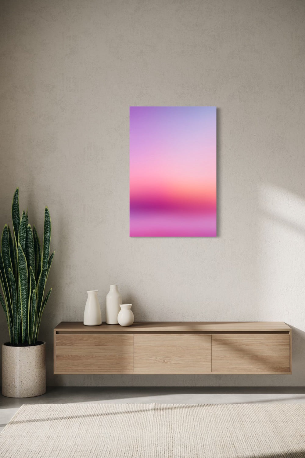 Rose Horizon aura gradient canvas shown on a wall above a light oak floating console with ceramic vases