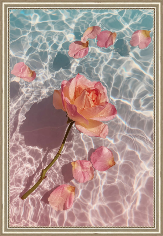 Rose in Water I: coral rose and scattered petals floating on sunlit pink and blue water, unframed print
