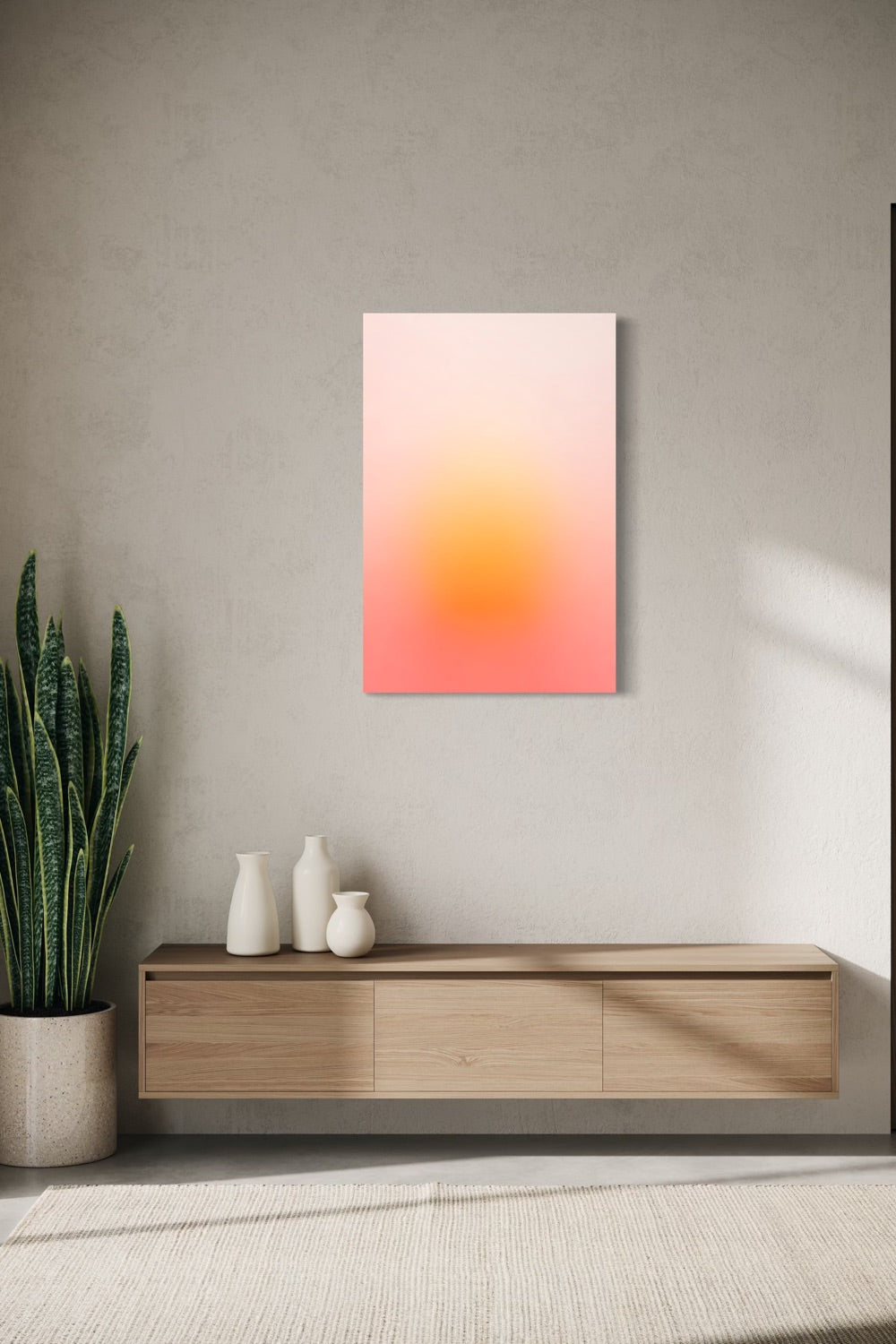 Solar Bloom aura gradient canvas shown on a wall above a light oak floating console with ceramic vases